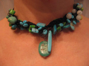 1. Turquoise on soft wire and crocheted deerskin
